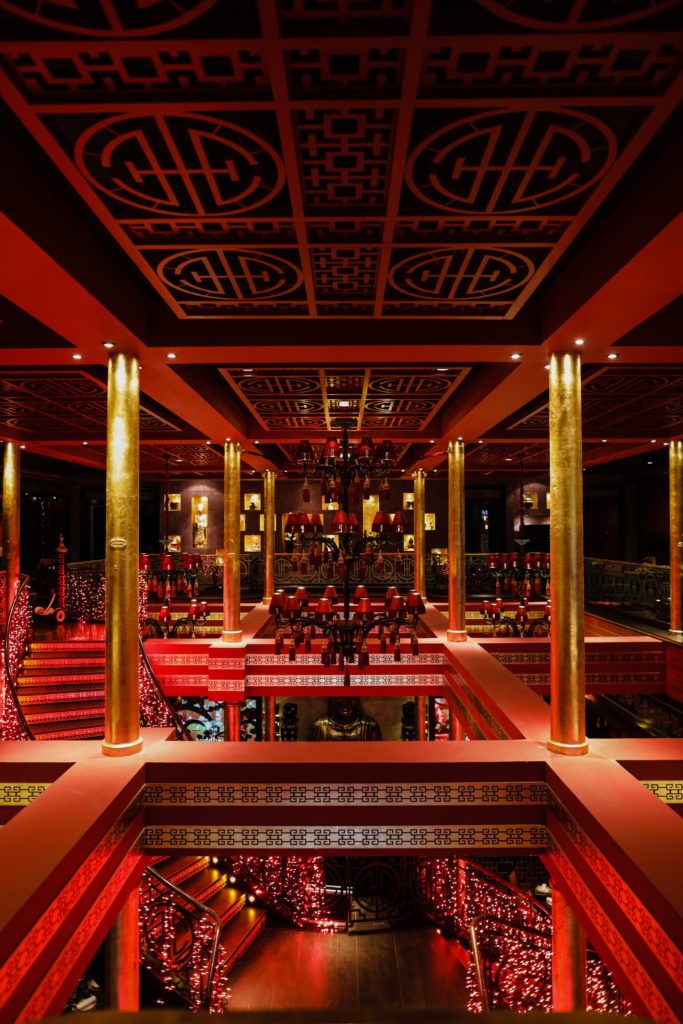 The interior of a Surrey restaurant is lit up with red lights.